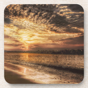 Posavasos Amanecer impresionante en la playa