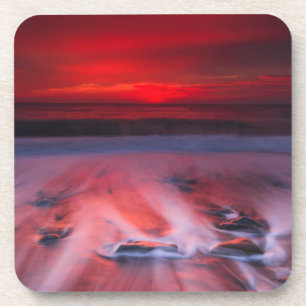 Posavasos Amanecer sobre el mar tempestuoso