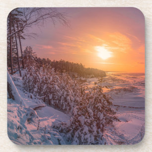 Posavasos Atardecer sobre la costa del mar de nieve