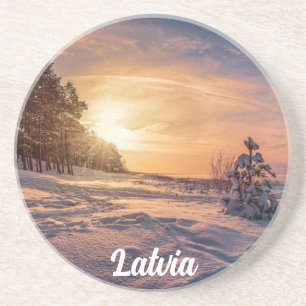 Posavasos Atardecer sobre la nevada costa del mar de inviern