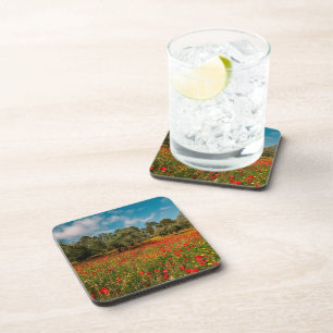 Posavasos campo con flores y árboles