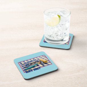 Posavasos Cangrejo azul con maleta sobre mantel de gingham C