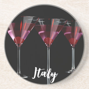 Posavasos Cócteles rojos en vidrio martini con cereza