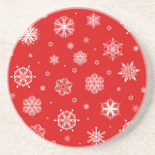 Posavasos Copos de nieve blancos sobre fondo rojo