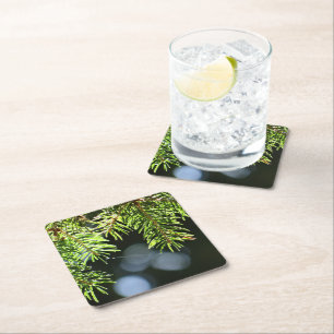 Posavasos Cuadrado De Papel Agujas de pino con bokeh