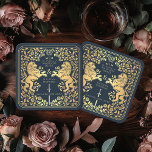 Posavasos Cuadrado De Papel Boda de espadas medievales del León Real Azul<br><div class="desc">¡Añade encanto real a tu escapada de mesa! Estos cascos de boda a medida presentan un majestuoso diseño de león y floral con sus nombres y monograma, todo de lujoso oro contra un fondo azul. Perfecto para una festividad medieval con elegancia intemporal. El oro que aparece en este artículo NO...</div>