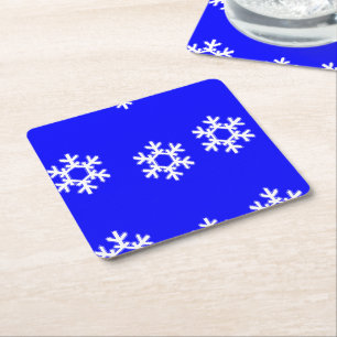 Posavasos Cuadrado De Papel Copos de nieve blancos en azul