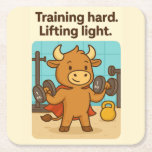 Posavasos Cuadrado De Papel Formación dura, luz de elevación - Gracioso Bullio<br><div class="desc">¡Pon la mesa con una dosis de humor en el gimnasio! Esta montaña rusa de papel muestra a Bullio, el toro audaz con grandes sueños de levantamiento — con orgullo sosteniendo sus pandillas de 1 kg bajo el gracioso lema: "Entrenar duro. Iluminación". Perfecto para fiestas, eventos relacionados con el fitness,...</div>
