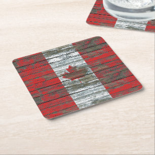 Posavasos Cuadrado De Papel La bandera canadiense en la madera áspera sube a