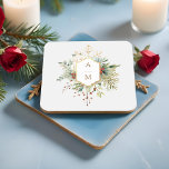 Posavasos Cuadrado De Papel Monograma floral de Navidades simplemente elegante<br><div class="desc">Esta encantadora montaña de montaña botánica de invierno cuenta con ramos de rosas y flores de marfil,  bayas rojas de flores,  abetos y copos de nieve dorados que rodean un elegante sello dorado para su monograma sobre un fondo gris perla pálido. Incluye campos de texto modificables.</div>