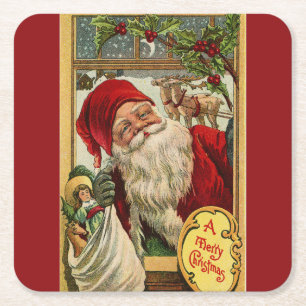 Posavasos Cuadrado De Papel Santa en la ventana con la escayola de papel cuadr