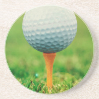 Posavasos De Arenisca El Golfing - pelota de golf en la camiseta