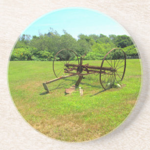 Posavasos De Arenisca Equipamiento agrícola viejo oxidado