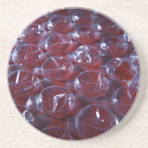 Posavasos De Arenisca Monstruo de piedra arenisca con envoltorio roto