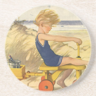 Posavasos De Arenisca Niño ventilado jugando en la playa con juguetes de