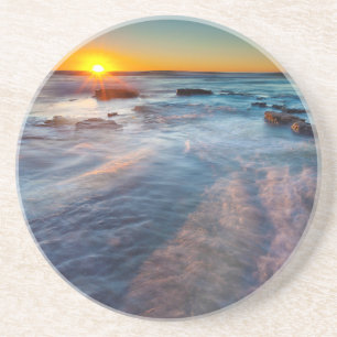 Posavasos De Arenisca Rayos de sol iluminan el Océano Pacífico