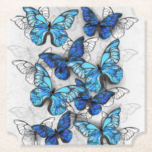 Posavasos De Papel Composición de las mariposas blancas y azules