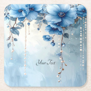 Posavasos de papel de flores azules y perlas