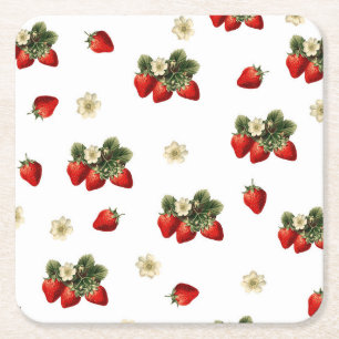 Posavasos de papel de fresa con flores sobre fondo