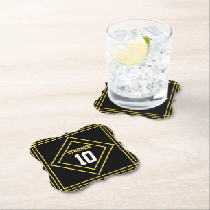 Posavasos de papel negro y amarillo inspirado en d