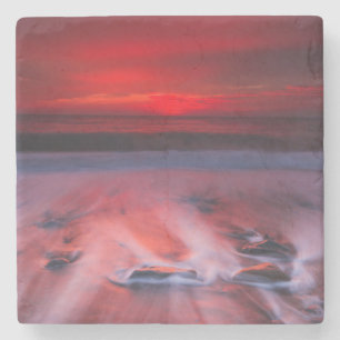 Posavasos De Piedra Amanecer sobre el mar tempestuoso