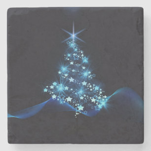 Posavasos De Piedra Brillo azul de estrellas en árbol de Navidad oscur