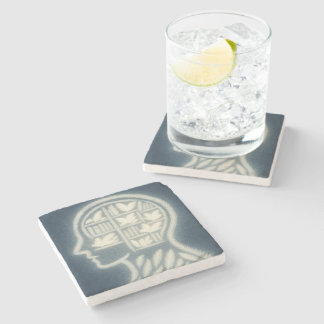 Posavasos De Piedra Cabeza llena de libros de la Fatería Blanca en la 
