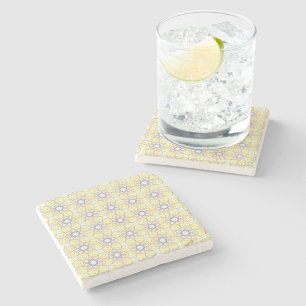 posavasos de piedra con patrón geométrico decorati