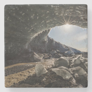 Posavasos De Piedra Estallido de sol en la entrada de la cueva de hiel