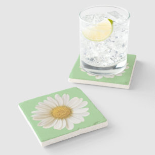 Posavasos De Piedra La margarita blanca sobre la flor de fondo verde s