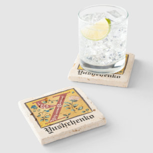 Posavasos De Piedra Letra medieval floral iluminada y monograma