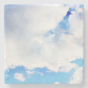 Posavasos De Piedra Nubes blancas esponjosas y cielo azul