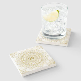 Posavasos De Piedra Oro sobre patrón de mandal ornamental blanco