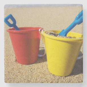 Posavasos De Piedra Palas y cubos en la playa de Sandy