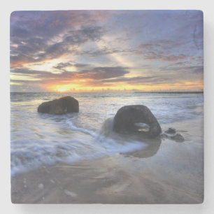 Posavasos De Piedra Puesta del sol en la playa de Kedonganan