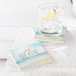 Posavasos De Piedra Respira en la playa