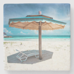 Posavasos De Piedra Silla de playa y playa de plata de las arenas del