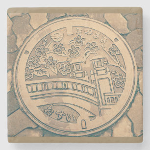 Posavasos De Piedra Tapa de alcantarilla y piedra de adoquín de carret