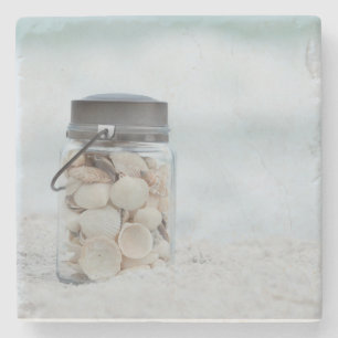 Posavasos De Piedra Tarro de Seashells en la playa el   la Florida