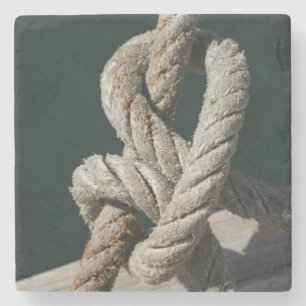 Posavasos De Piedra Un nudo atado en un embarcadero el   Portugal