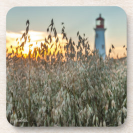 Posavasos de un faro en unos campos