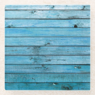 Posavasos De Vidrio Madera natural azul, fondo texturado.