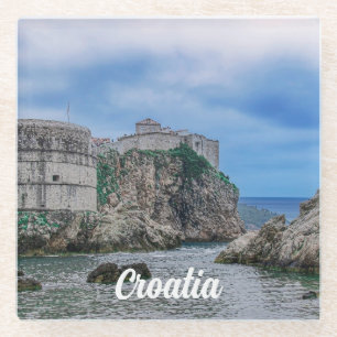 Posavasos De Vidrio Paredes de fortaleza, costa rocosa y mar en Croaci