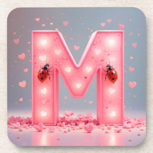 Posavasos Diseño de letra M rosa brillante