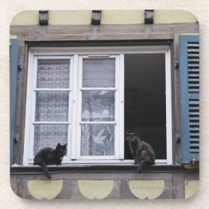 Posavasos Dos gatos negros en la ventana