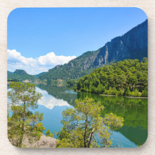 Posavasos Foto de la reflexión de la montaña en el lago escé