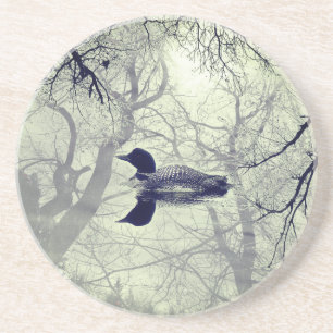 Posavasos Globo blanco y negro sobre la arenisca del lago