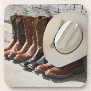 Posavasos Gorra de vaquero en la fila de las botas de
