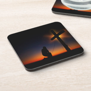 Posavasos Hombre arrodillado antes de cruzar el atardecer