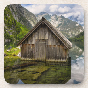 Posavasos Hostal en el lago Obersee en los Alpes de Alemania